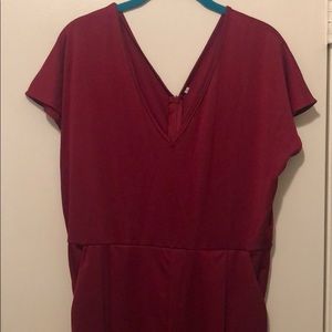 Wine red V neck jumpsuit. Never worn or washed